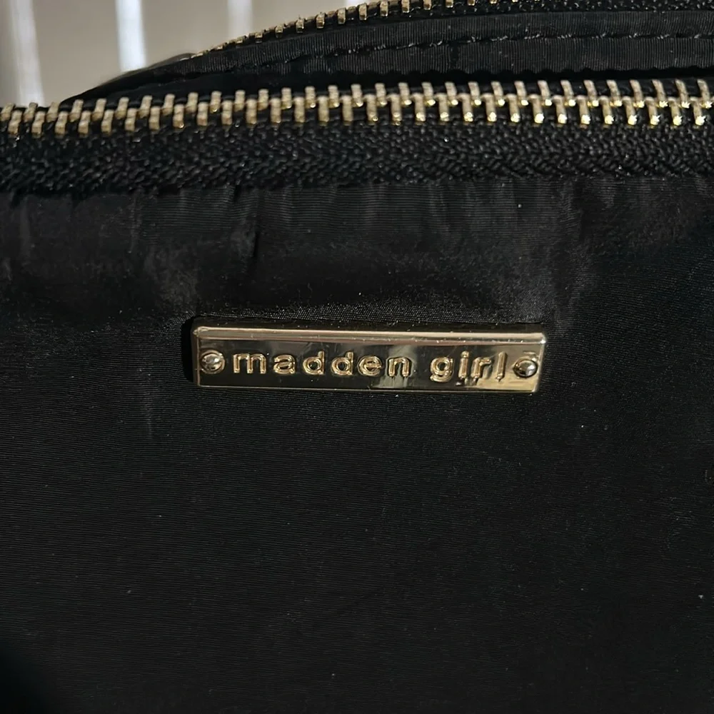 MADDEN GIRL Black Crossbody with Gold Accents. On trend and super convenient.
